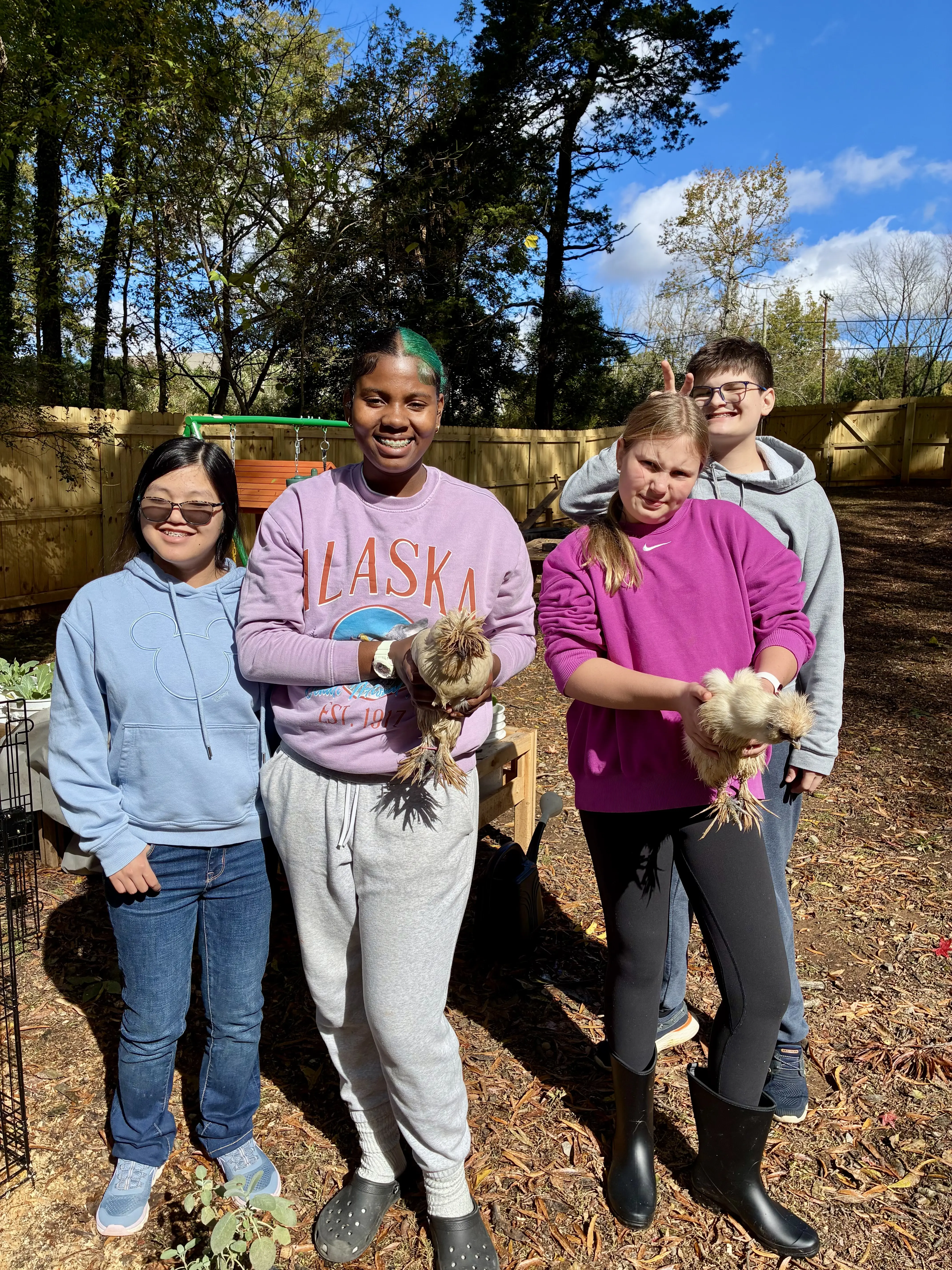 Middle schoolers with chickens